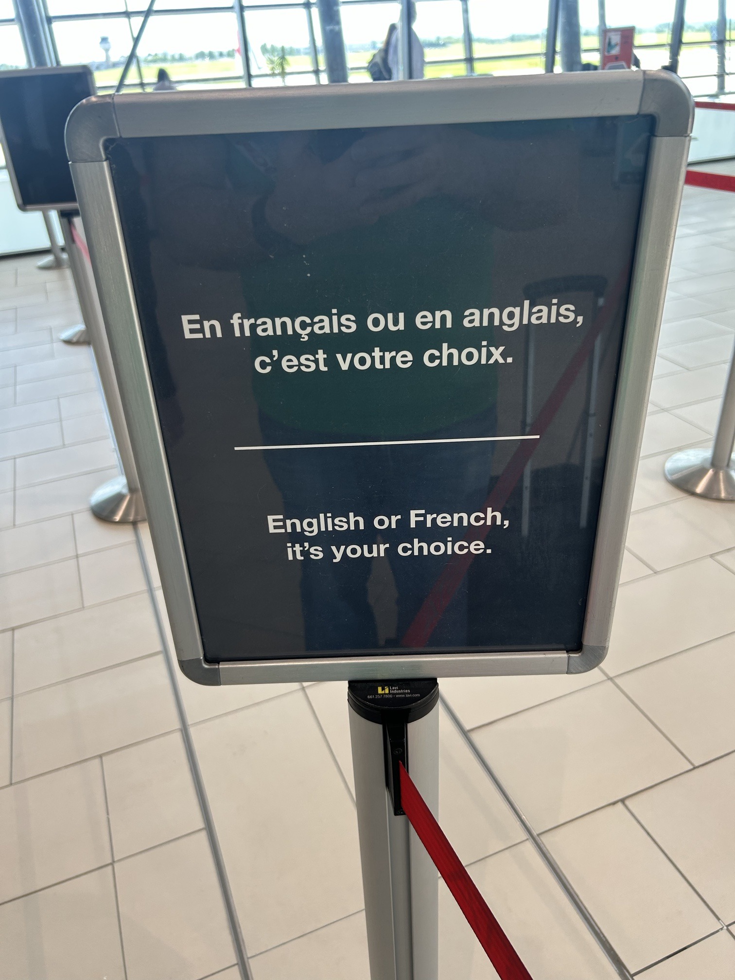 Bilingual airport sign